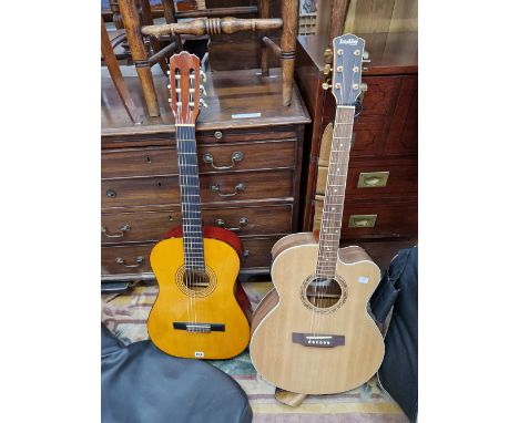 A CASED INDIE GUITAR TOGETHER WITH A CASED TANGLEWOOD TW 40 GUITAR