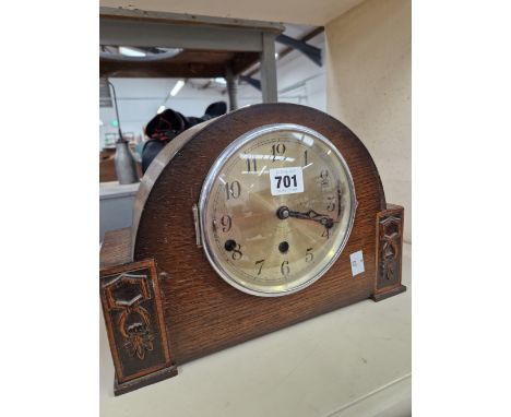 A WURTEMBURG CLOCK CHIMING ON RODS AND WITHIN AN OAK CASE
