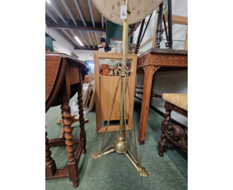 A VICTORIAN BRASS STANDARD LAMP. 