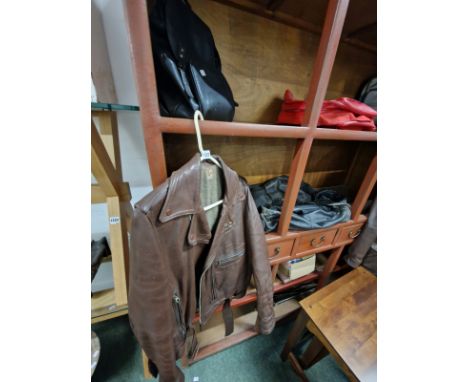 VINTAGE LEATHER JACKETS AND LUGGAGE.