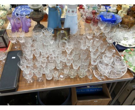 A CUT GLASS PART SET OF DRINKING GLASS, OTHER GLASS, A CLOCK, A CASED CARVING SET AND DECORATIVE PLATES