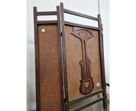 AN ART NOUVEAU FIRE SCREEN. 
