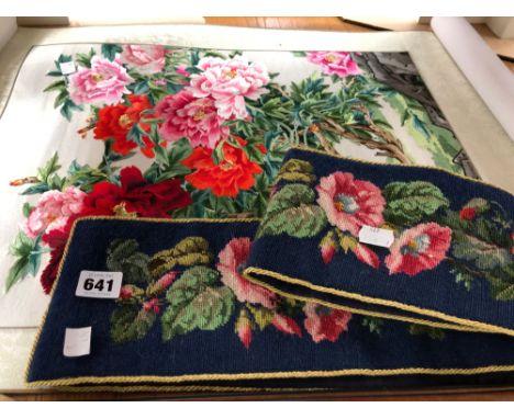 A CHINESE SILK NEEDLE WORK FLORAL SCROLL TOGETHER WITH A BLUE GROUND WOOL BELL PULL PANEL WORKED WITH FLOWERS