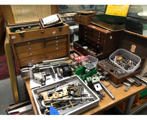 A COLLECTION OF WATCH AND CLOCK MAKERS TOOLS, TO INCLUDE DRILL BITS, LATHES, A MAHOGANY AND ANOTHER WOODEN TOOL BOX, ETC.