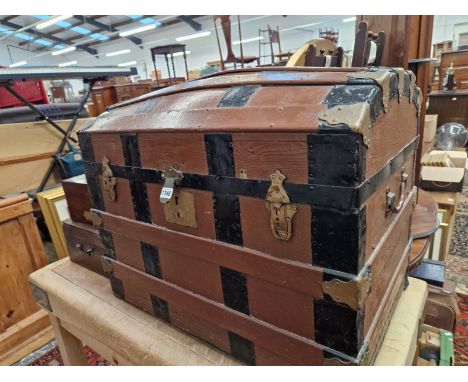 AN ANTIQUE DOME TOP WOOD SLAT CABIN TRUNK. 