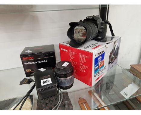 A CANON 350D CAMERA WITH TWO LENSES AND AN OLYMPUS D-545 ZOOM CAMERA