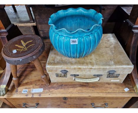 A TURQUOISE POTTERY PLANTER, A VELLUM SUITCASE TOGETHER WITH A STOOL PAINTED WITH WHEAT EARS