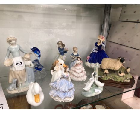 A COLLECTION OF NAO, WORCESTER AND OTHER FIGURINES