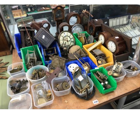 A COLLECTION OF CLOCK CASES AND PARTS