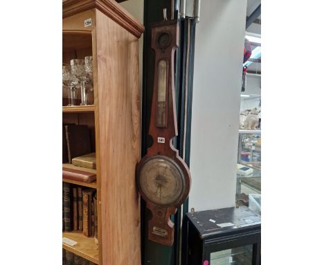 A MAHOGANY WHEEL BAROMETER WITH AN ALCOHOL THERMOMETER BY CICERI  + PINI, EDINBURGH