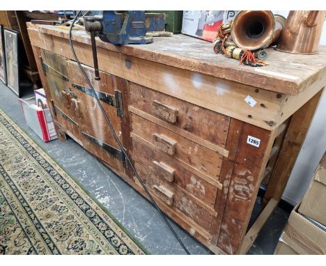 A VINTAGE PINE WORK BENCH. 85 X 160 X 60cms. 