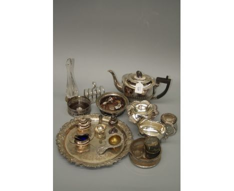 A mixed lot of EPNS including vine cast and other trays, wine coasters, sauce boat, mother of pearl handled fruit knives and 