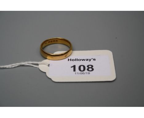 A 22ct gold wedding band 6.6g, Ring size R