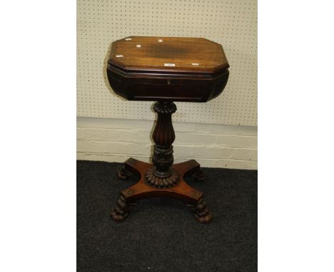 A William IV mahogany teapoy, the caddy top with vacant interior on baluster concave base and lion's paw feet, 77cm
