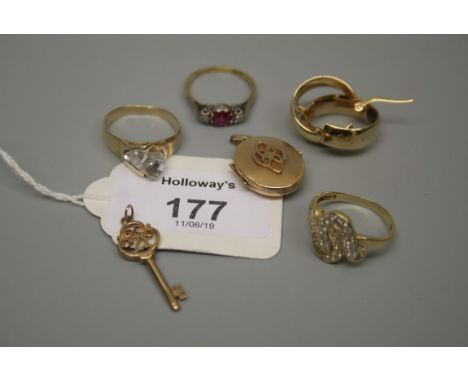 A three stone half hoop ring, a pair of continental hoop earrings, marked 585, together with a small oval locket, two further