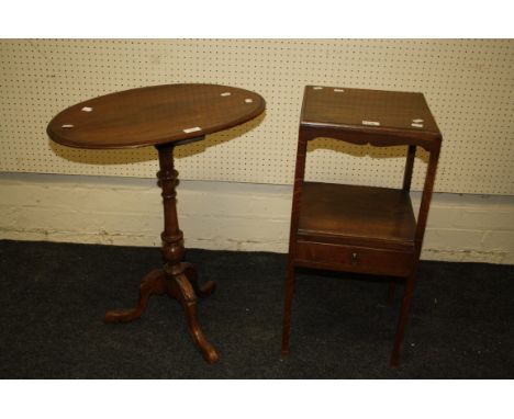 A late Victorian beech tripod table with oval top, together with an early 19th century oak night stand