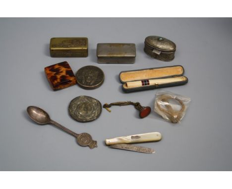 A collectors lot, including an Edwardian ivory cigarette holder in fitted case, a mother of pearl fruit knife with silver bla