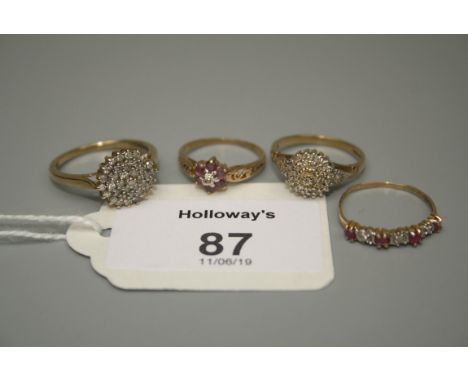 A diamond cluster ring together with another diamond cluster ring and two ruby and diamond rings, 6.8g