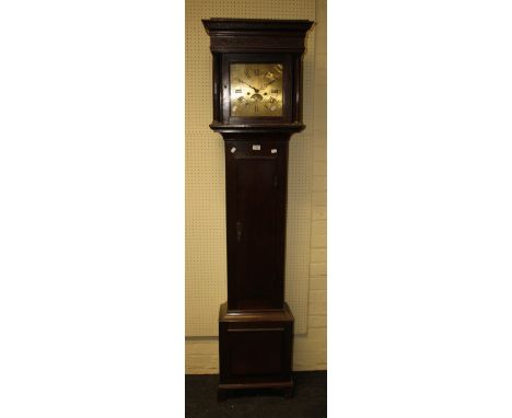 An oak longcase clock, the ten inch brass square dial with calendar supporting a twin train bell striking movement. Signed Ri