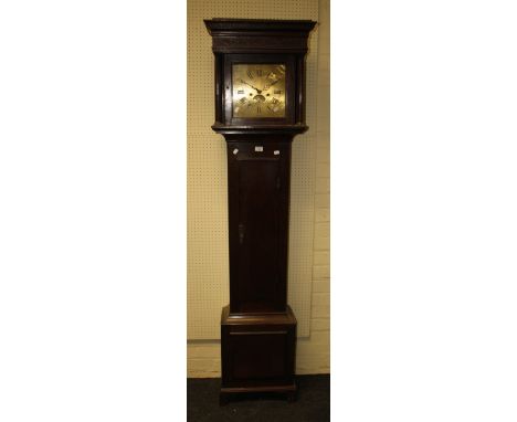 An oak longcase clock, the ten inch brass square dial with calendar supporting a twin train bell striking movement. Signed Ri