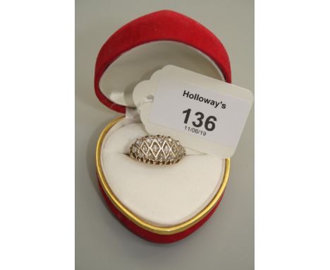 A mixed old cut diamond lattice worked three tier ring, in carved mount, 6.6g, Size N