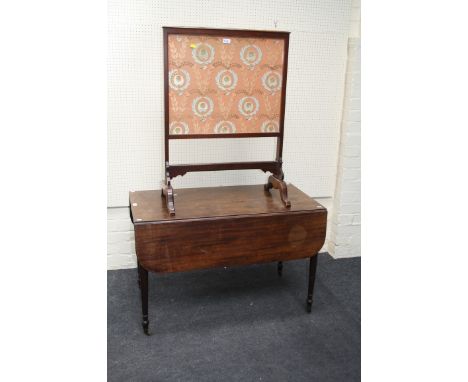 An early 19th century mahogany Pembroke table, the rectangular top and twin flaps with reeded edge over true and false end dr