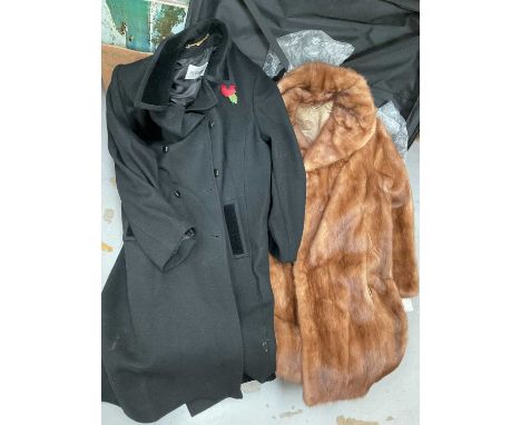 Three suitcases containing vintage clothing including Burberrys' black wool coat, child's Burberry tweed coat, fur coat, univ