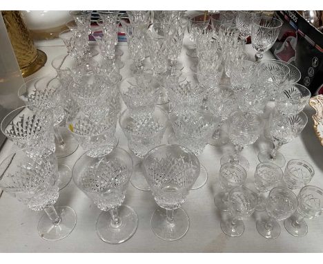 Eleven Waterford crystal wine glasses, together with other cut glass including Stuart crystal