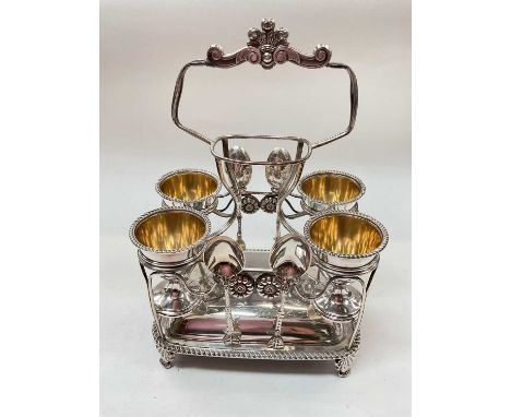 Victorian silver plated four person egg cup set on stand with four silver teaspoons