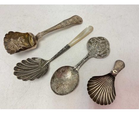 Three silver caddy spoons and one white metal (4)