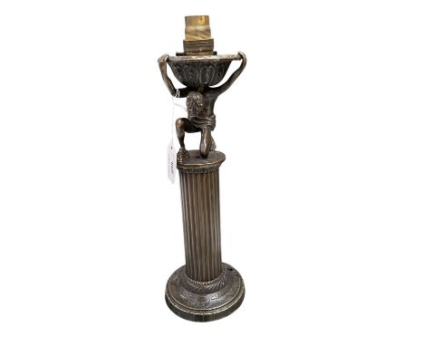 Bronzed metal table lamp of atlas, 34cm in overall height. 