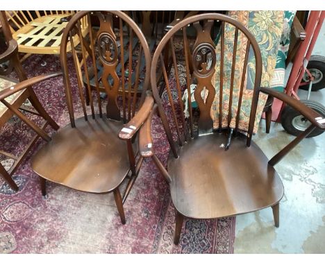 Two pairs of Ercol chairs