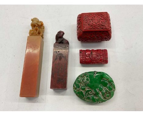Two Chinese carved hard stone seals, two other carved plaques and a small cinnabar box with cover (5)
