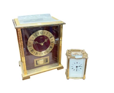 Brass carriage clock together with a German quartz mantel clock (2).