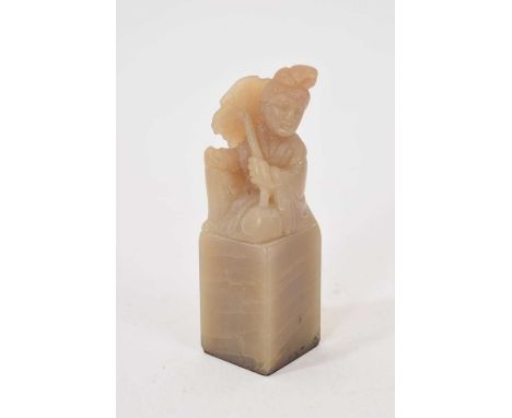 Chinese carved jade seal, carved with a seated figure and Chinese and European text characters, 6.5cm high
