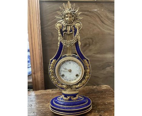 Reproduction clock in porcelain caseThe Clock is in good overall condition with no chips on the porcelain case, the clock app