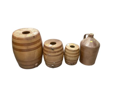 Set of 3 graduated Doulton Lambeth stoneware barrels, the largest 42.5cm high, along with a stoneware pitcher