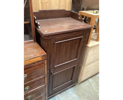 Stained pine cupboard with shelved interior enclosed by panelled door, 70cm wide, 48cm deep, 136cm high