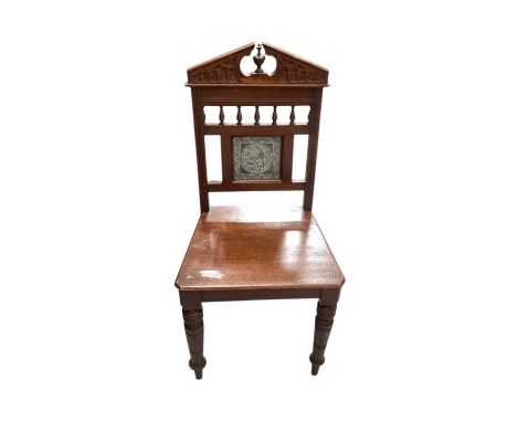 Victorian mahogany hall chair with inset tiled back depicting a bird