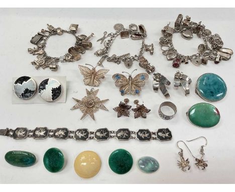 Three silver charm bracelets together with other silver and white metal jewellery, Ruskin brooch and similar buttons/pottery 