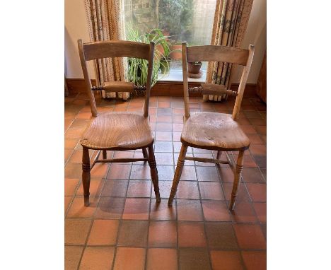 Set of six 19th century ash and elm dining chairs, each with bar back and saddle seat, and similar elbow chair