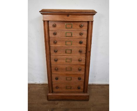 Victorian walnut Wellington chest, having seven graduated drawers with flanking locking stile on plinth base, 60cm wide x 40c