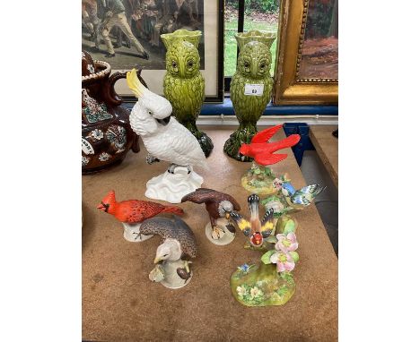 Pair of Burmantofts type majolica green glazed owl spill vases with glass eyes, together with a group of ceramic bird ornamen