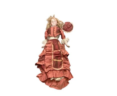 Bisque head doll with kid leather body, lace trimmed clothing