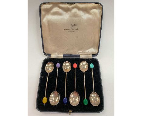 Set of six silver and enamel bean end coffee spoons in a fitted case, by Walker &amp; Hall (Birmingham 1937)