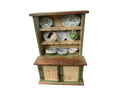 Miniature painted dresser and miniature ceramics, 45cm high
