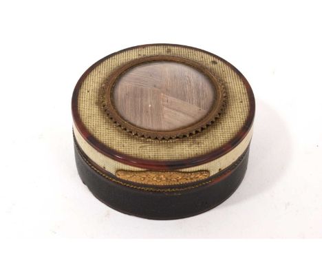 18th century horn circular snuff box with woven hair panel and gilt ormolu mounts, 6.5cm diameterThe box is in reasonable con
