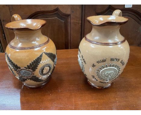 Two Doulton jugs with interesting texts - one with "He that buys flesh, buys bones", the other "Bitter must be the cup that a