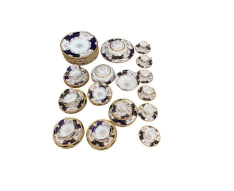 Good quality Coalport tea service with floral garlands on blue and gilt ground, 61 piecesThree of the large saucers don't sou