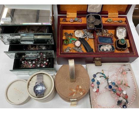 Two jewellery boxes containing silver gem set rings, three silver fobs, wristwatches and a quantity of costume jewellery